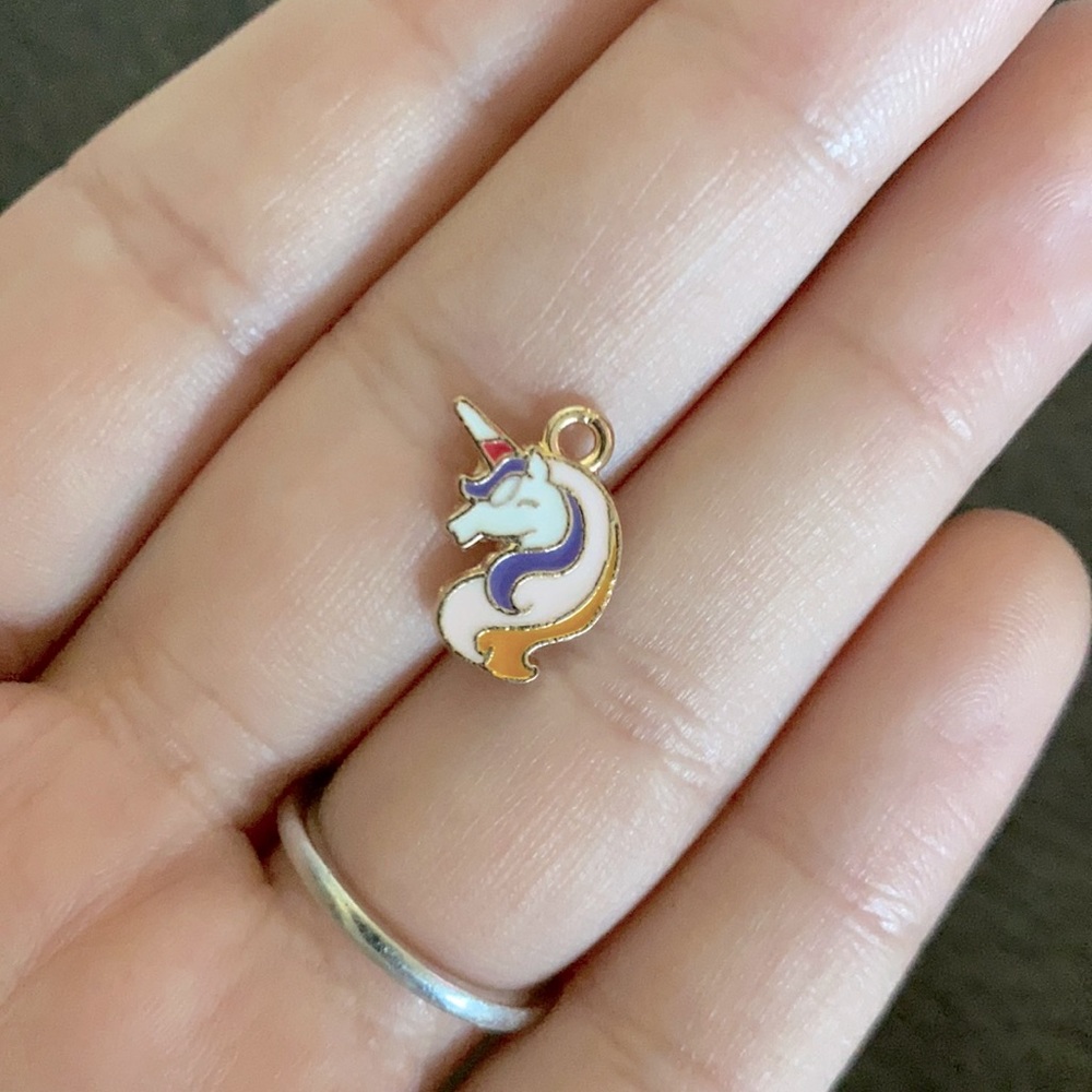 3/$30 gold plated and enamel unicorn charm🦄